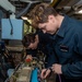 USS Ronald Reagan (CVN 76) Sailors inspect aviation electronic equipment