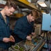 USS Ronald Reagan (CVN 76) Sailors inspect aviation electronic equipment