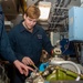 USS Ronald Reagan (CVN 76) Sailors inspect aviation electronic equipment