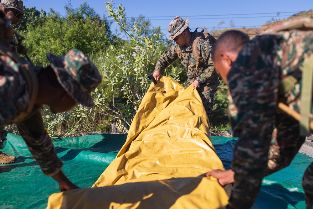 MRF-D engineers, ADF Soldiers, and Timor-Leste Defense Force Soldiers participate in the culminating event of Hari’i Hamutuk 23