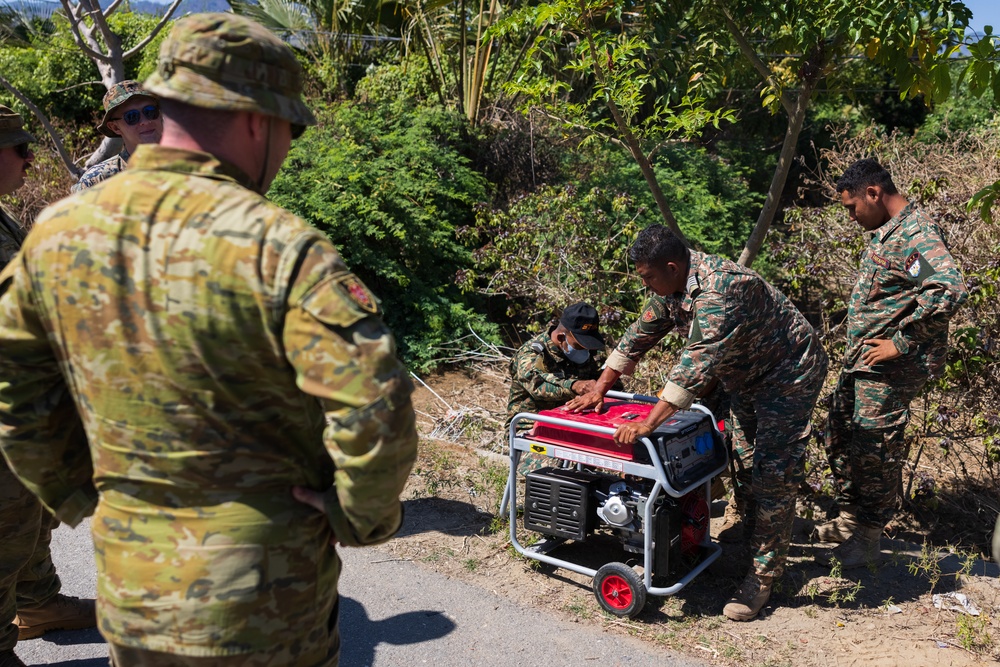 MRF-D engineers, ADF Soldiers, and Timor-Leste Defense Force Soldiers participate in the culminating event of Hari’i Hamutuk 23