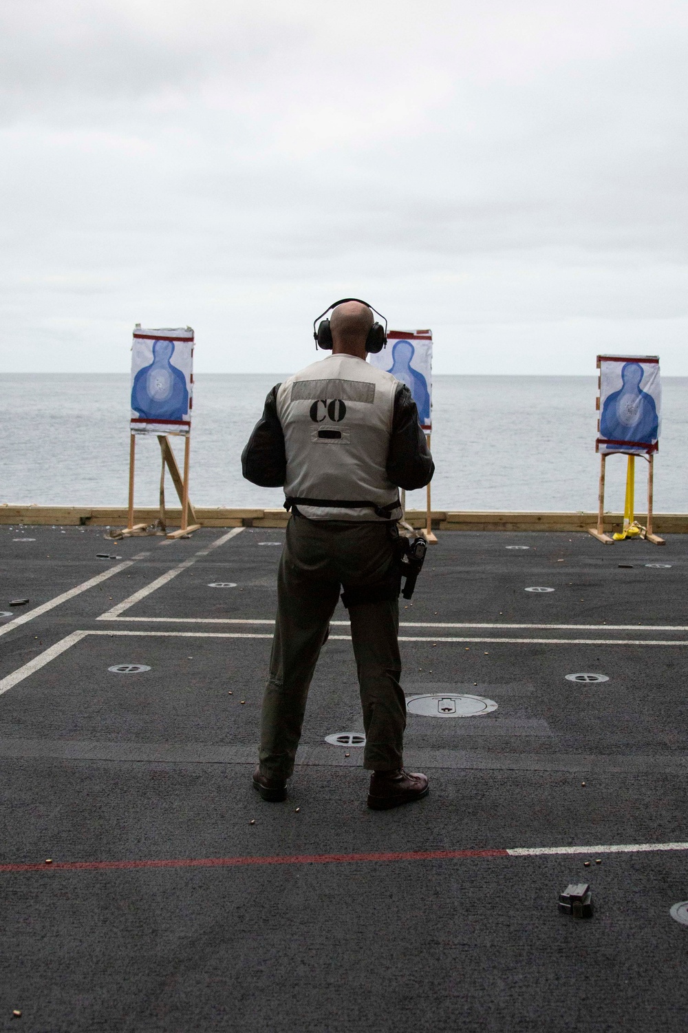 Abraham Lincoln Sailors participate in a live-fire exercise
