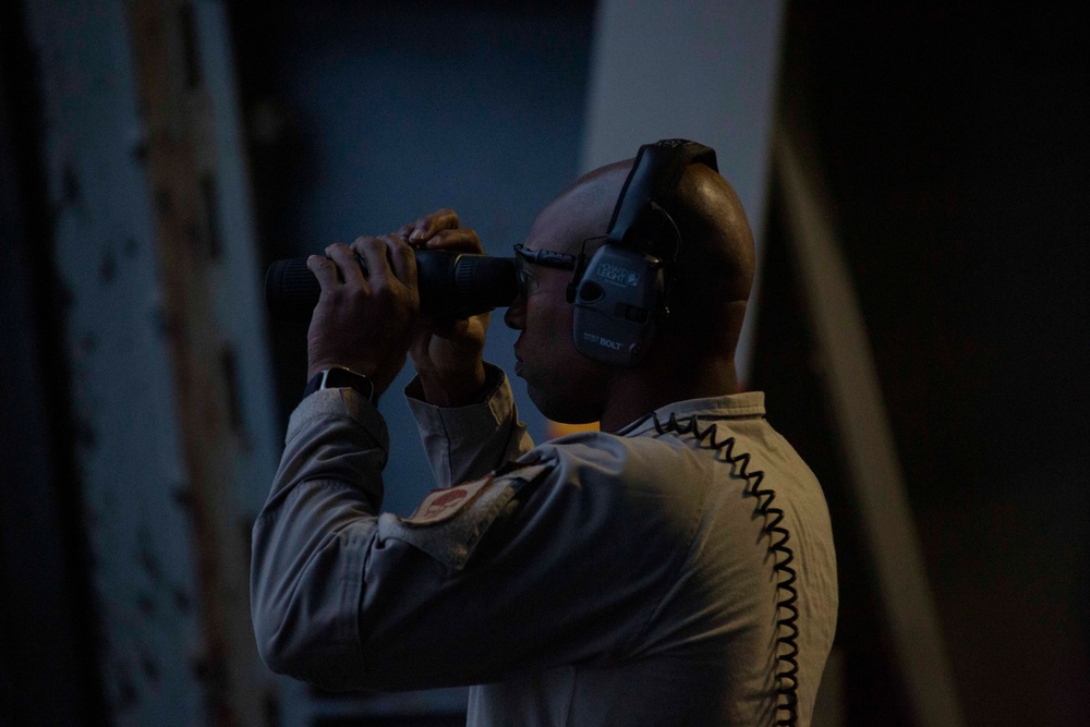 Abraham Lincoln Sailors participate in a live-fire exercise