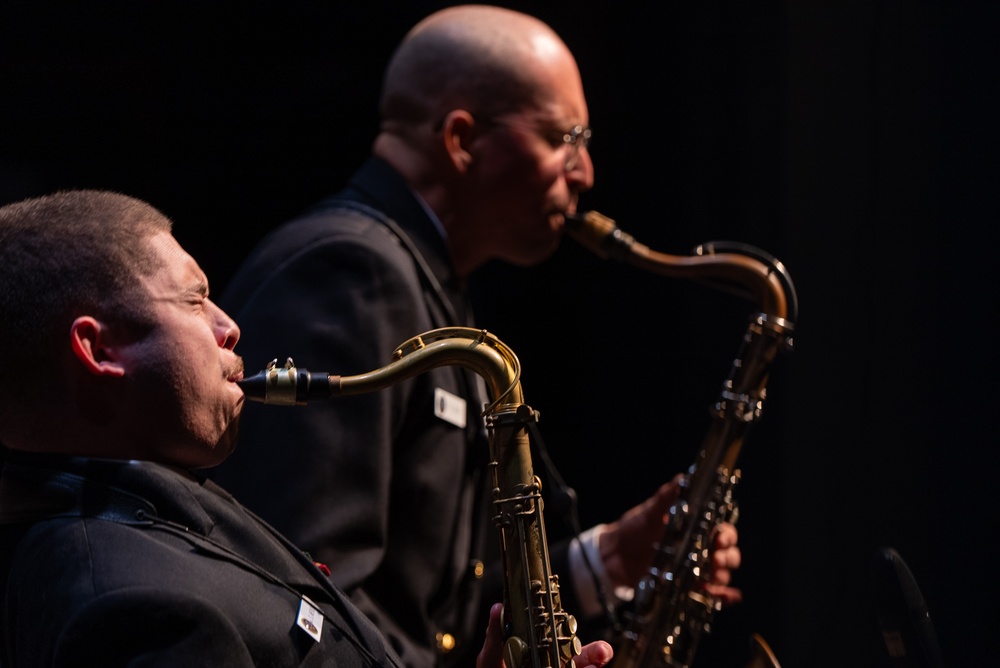 Musicians 1st Class Justin Mendez and Frank Silva have a dueling sax battle at Saenger Theater