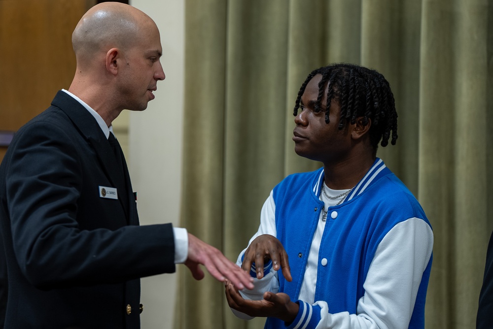 Chief Musician Jonathan Barnes talks to students at Florida State University