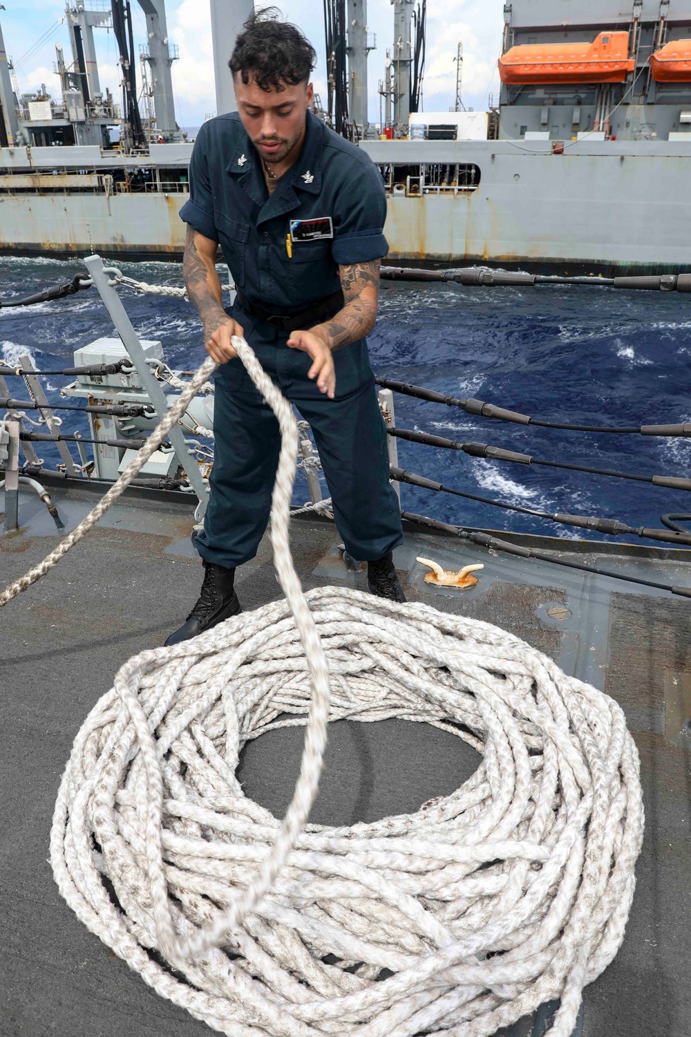 USS Shoup conducts replenishment-at-sea with USNS Tippecanoe and USNS Carl Brashear