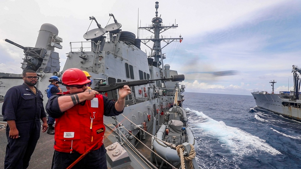 USS Shoup conducts replenishment-at-sea with USNS Tippecanoe and USNS Carl Brashear