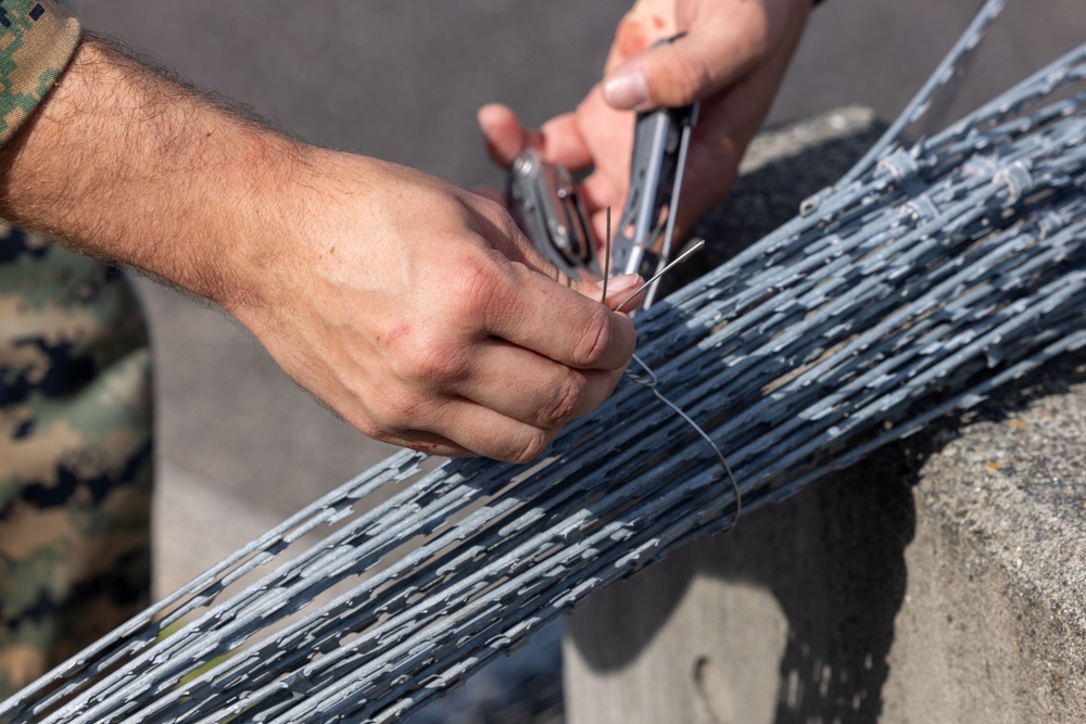 Active shield 2023; Marines set up concertina wire up around headquarters building