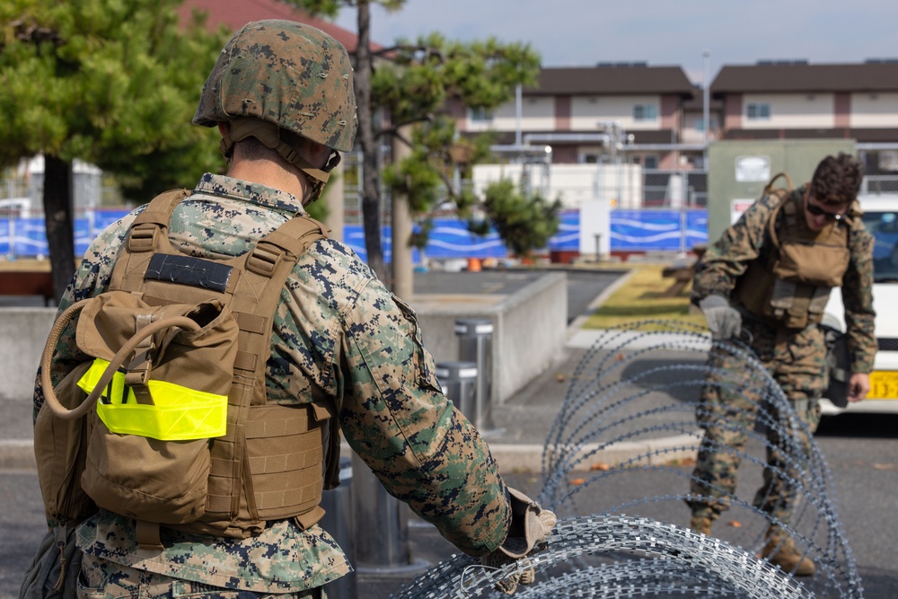Active shield 2023; Marines set up concertina wire up around headquarters building