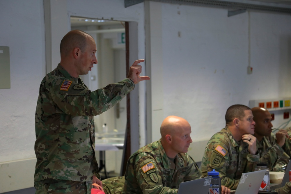U.S. Army Maj. Brian Martin engages in a brief during the 15th EN BN CPX