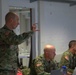 U.S. Army Maj. Brian Martin engages in a brief during the 15th EN BN CPX