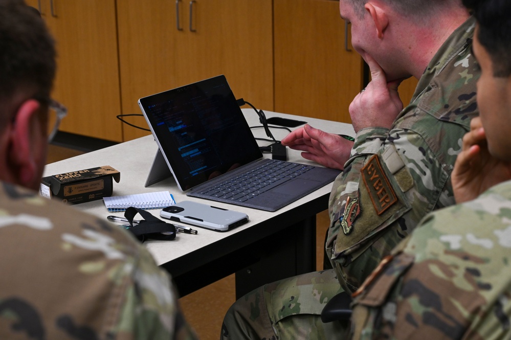 Dyess hones computer skills, strengthens community partnership with Hackathon