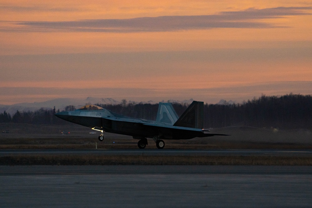 F-22 Raptors morning takeoff