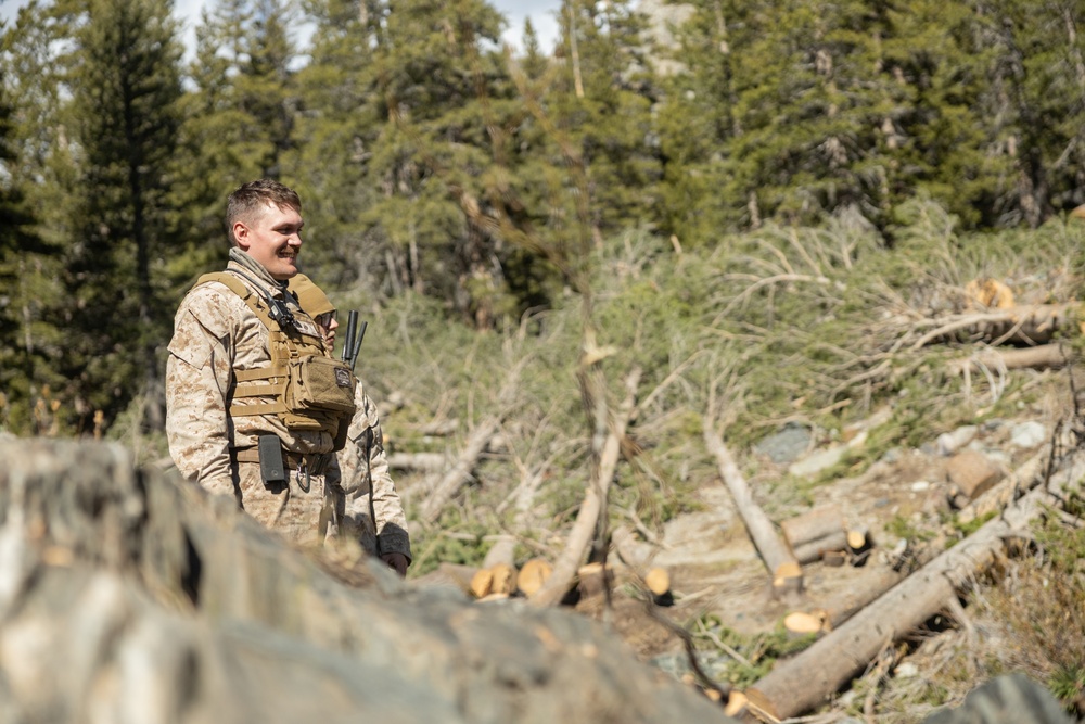 U.S. Marines, Sailors, and Forest Service personnel recover a downed U.S. Navy MH-60S Seahawk