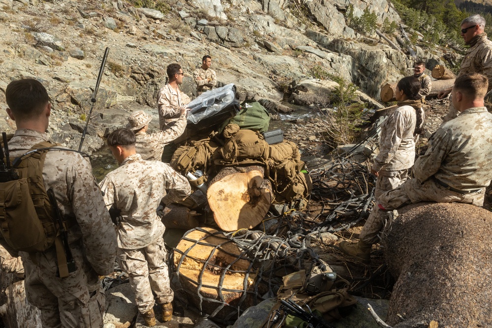 U.S. Marines, Sailors, and Forest Service personnel recover a downed U.S. Navy MH-60S Seahawk