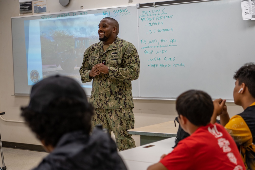 CBMU 303 Seabees COMREL event at Nanakuli High