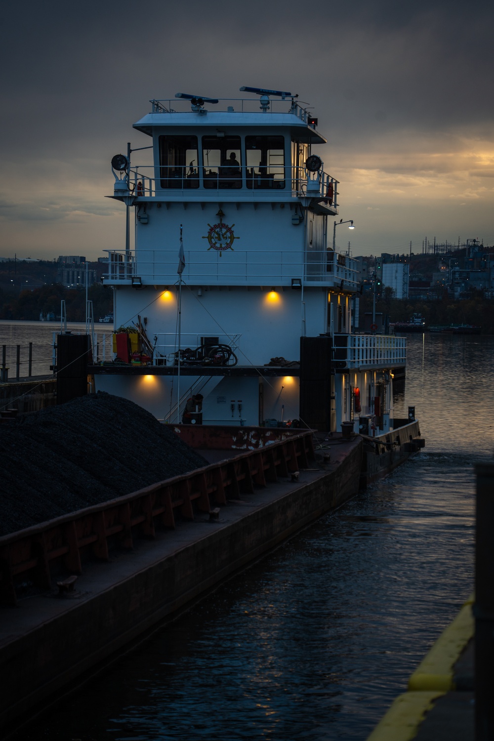 Montgomery lock and dam operators manage barge navigation on the Ohio River