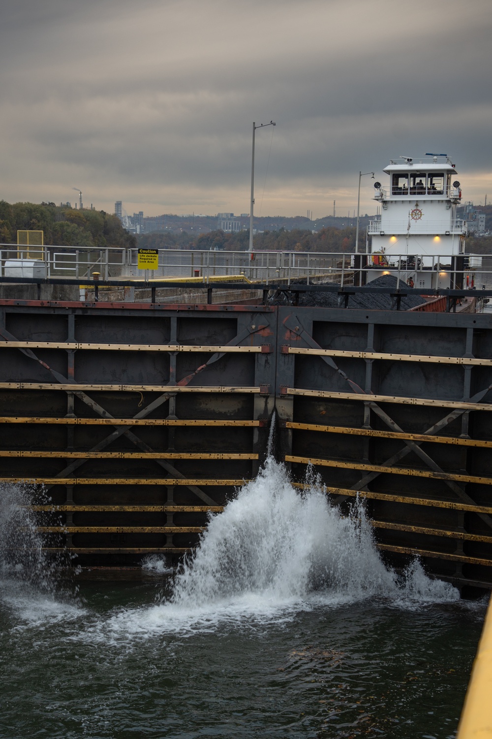 Montgomery lock and dam operators manage barge navigation on the Ohio River