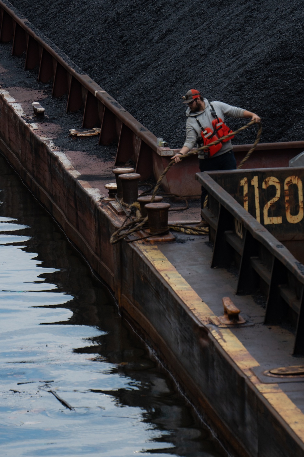 Montgomery lock and dam operators manage barge navigation on the Ohio River