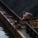 Montgomery lock and dam operators manage barge navigation on the Ohio River