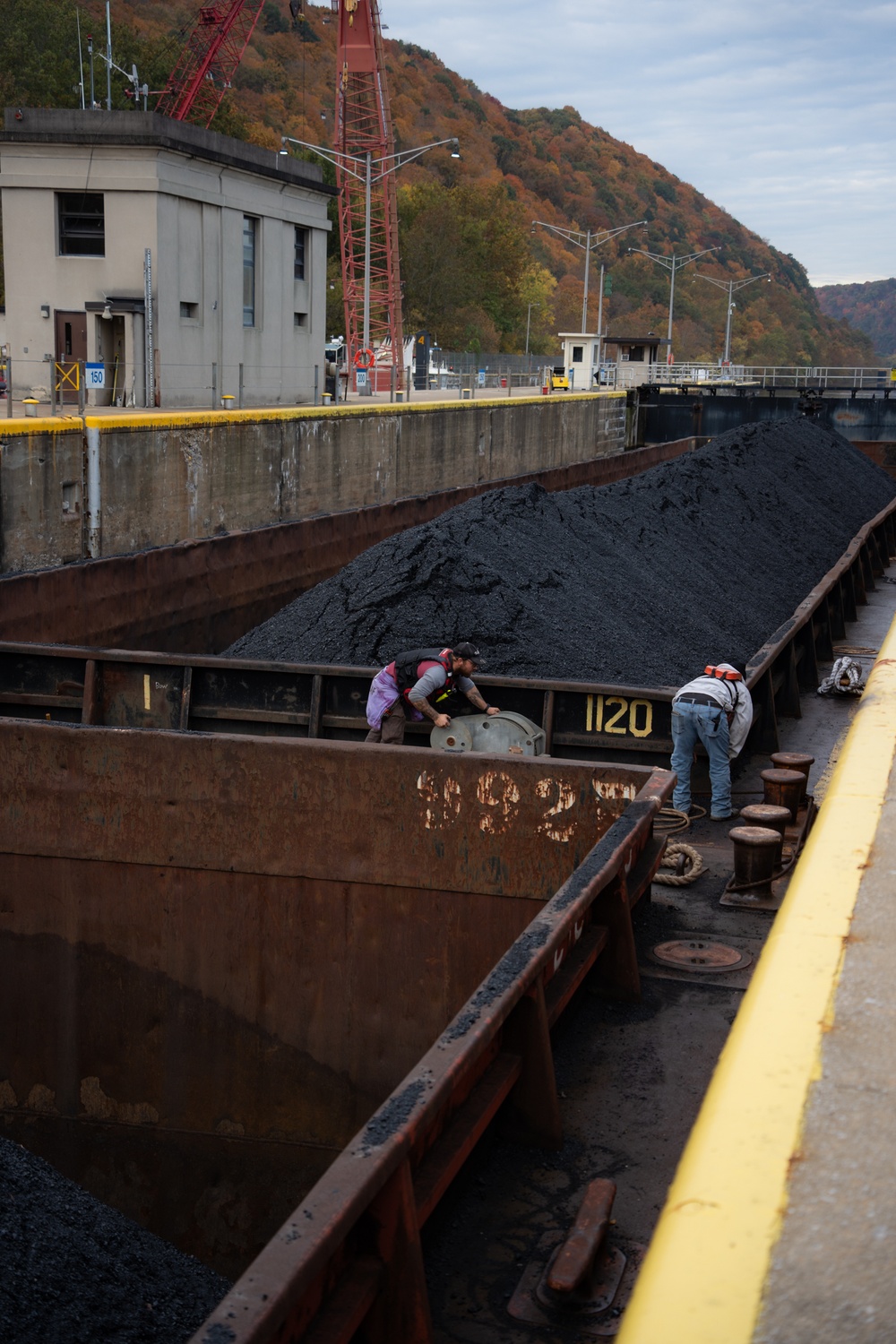 Montgomery lock and dam operators manage barge navigation on the Ohio River