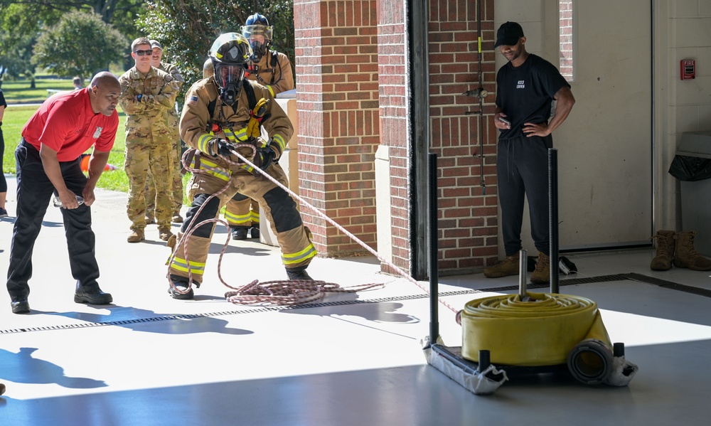 Airmen participate in Firefighter Combat relay Challenge