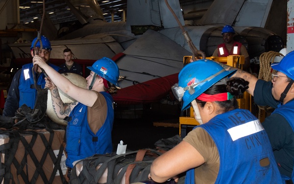USS Ronald Reagan (CVN 76) conducts fueling-at-sea with USNS Yukon (T-AO 202)