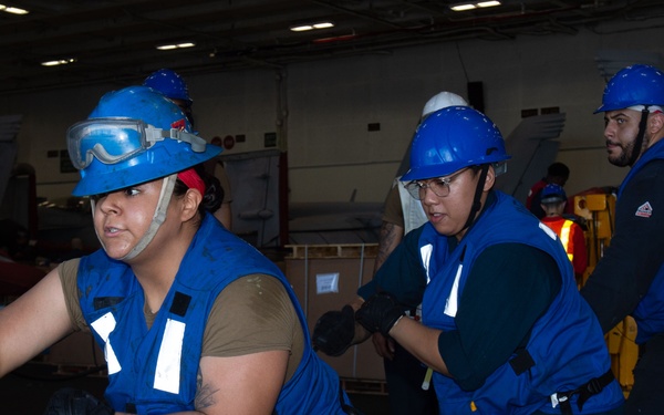 USS Ronald Reagan (CVN 76) conducts fueling-at-sea with USNS Yukon (T-AO 202)