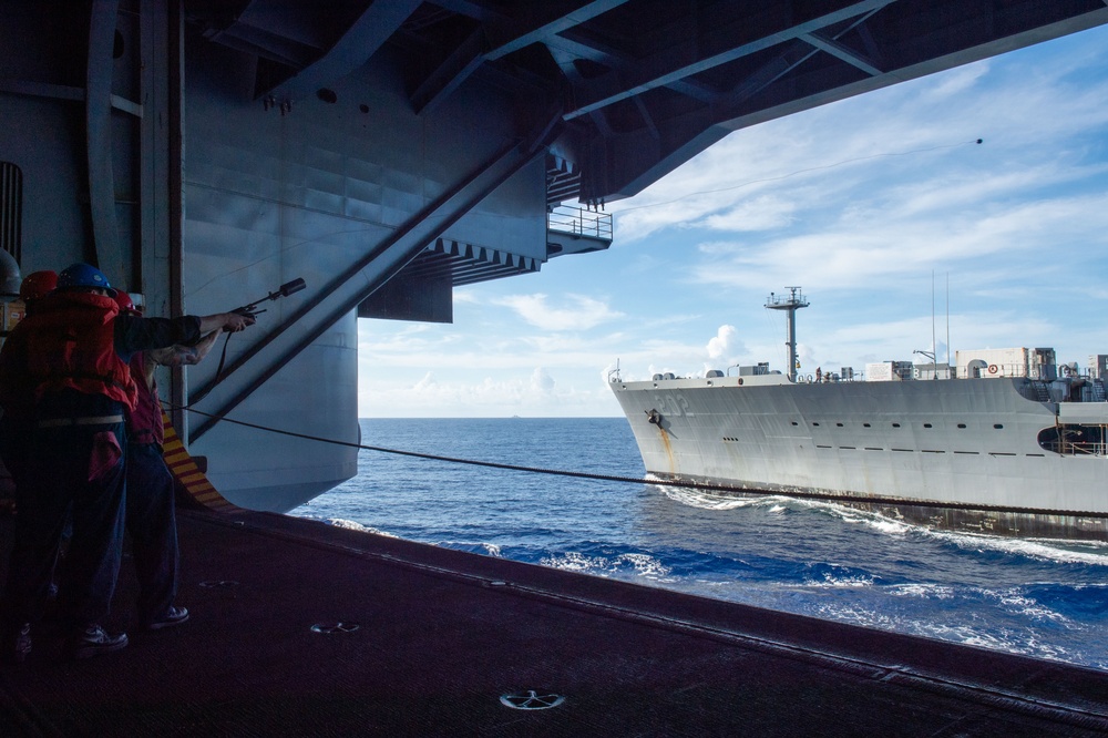 USS Ronald Reagan (CVN 76) conducts fueling-at-sea with USNS Yukon (T-AO 202)