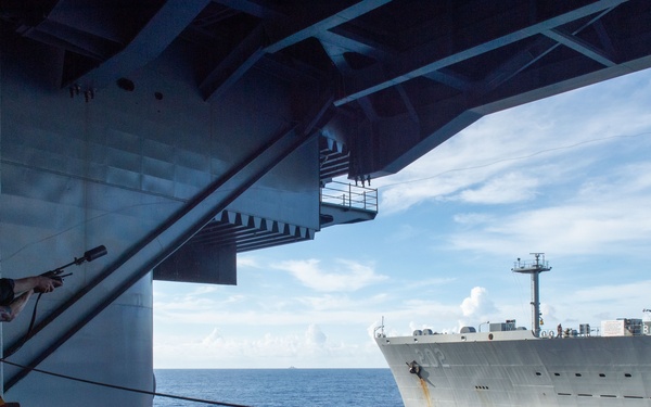 USS Ronald Reagan (CVN 76) conducts fueling-at-sea with USNS Yukon (T-AO 202)