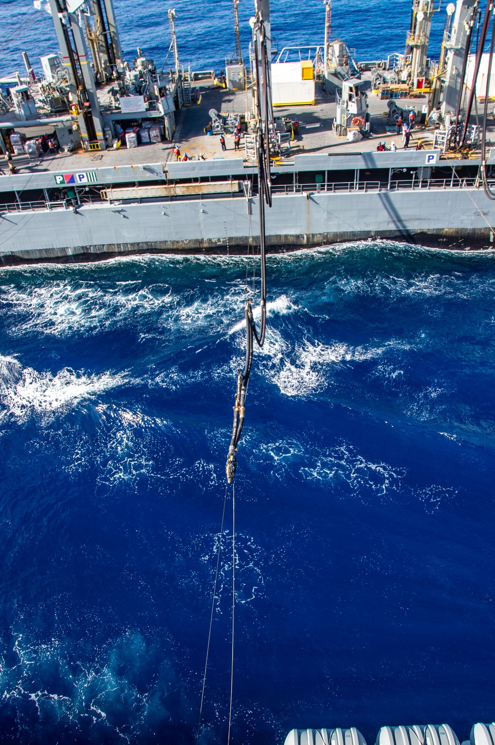 USS Ronald Reagan (CVN 76) conducts fueling-at-sea with USNS Yukon (T-AO 202)