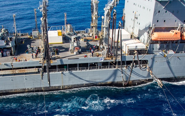 USS Ronald Reagan (CVN 76) conducts fueling-at-sea with USNS Yukon (T-AO 202)