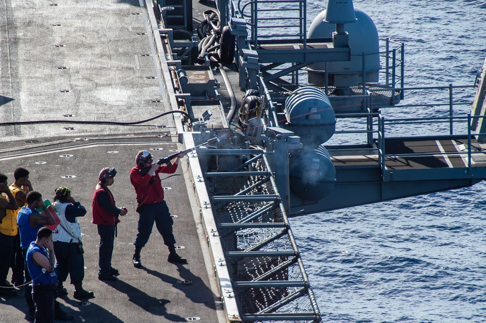 USS Ronald Reagan (CVN 76) conducts fueling-at-sea with USNS Yukon (T-AO 202)