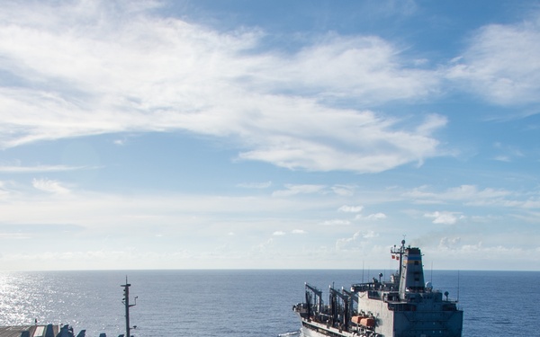 USS Ronald Reagan (CVN 76) conducts fueling-at-sea with USNS Yukon (T-AO 202)