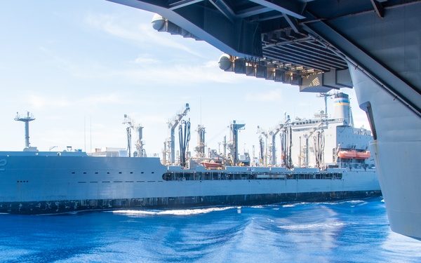 USS Ronald Reagan (CVN 76) conducts fueling-at-sea with USNS Yukon (T-AO 202)