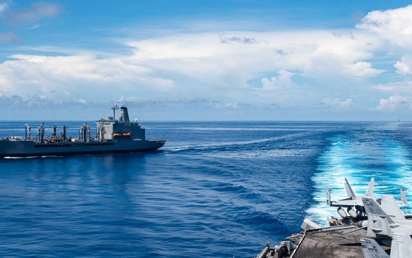 USS Ronald Reagan (CVN 76) conducts replenishment-at-sea with USNS Yukon (T-AO 202)