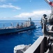 USS Ronald Reagan (CVN 76) conducts replenishment-at-sea with USNS Yukon (T-AO 202)