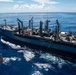 USS Ronald Reagan (CVN 76) conducts replenishment-at-sea with USNS Yukon (T-AO 202)