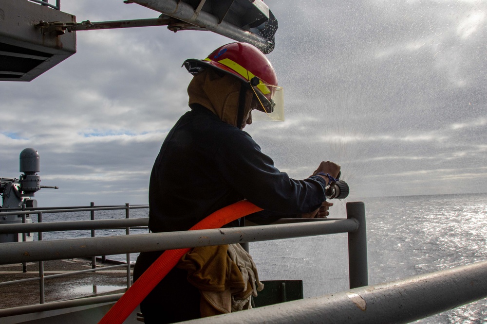 Abraham Lincoln conducts firemain hose maintenance