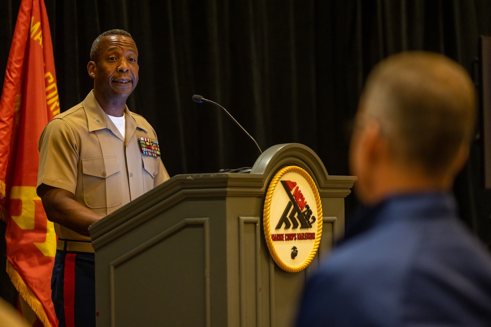 Col. Michael L. Brooks, base commander, Marine Corps Base Quantico, attends the 48th Marine Corps Marathon Press Conference