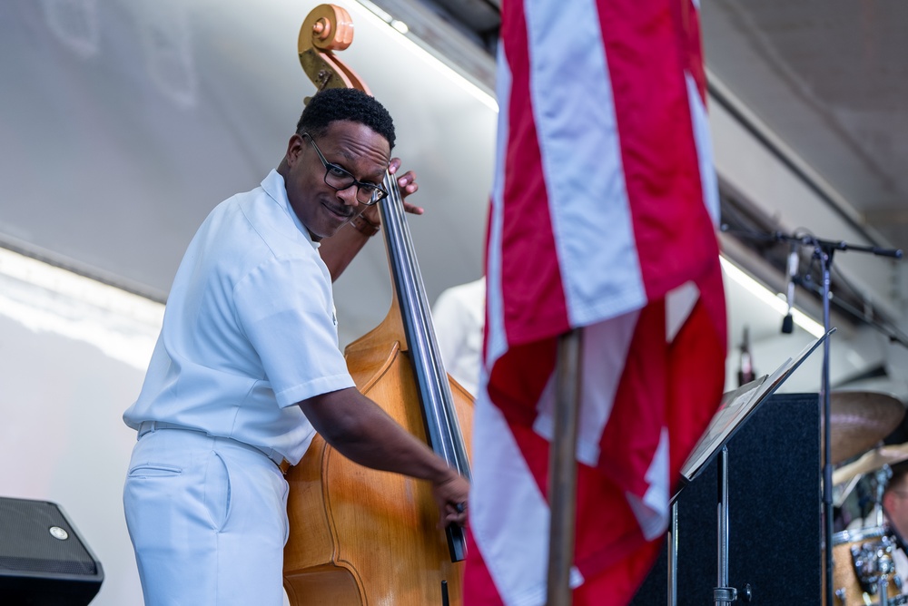 Musician 1st Class William Ledbetter performs at the Historic Thomas Center Gardens