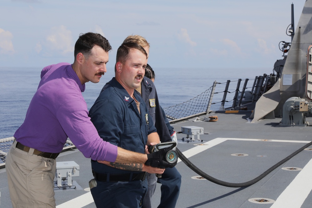 USS Mobile (LCS 26) Sailors Conduct Flight Deck Firefighting