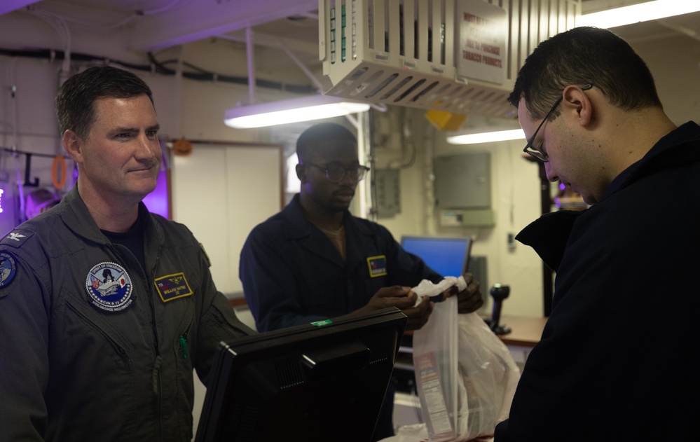 George Washington Executive Officer Works the Ship Store