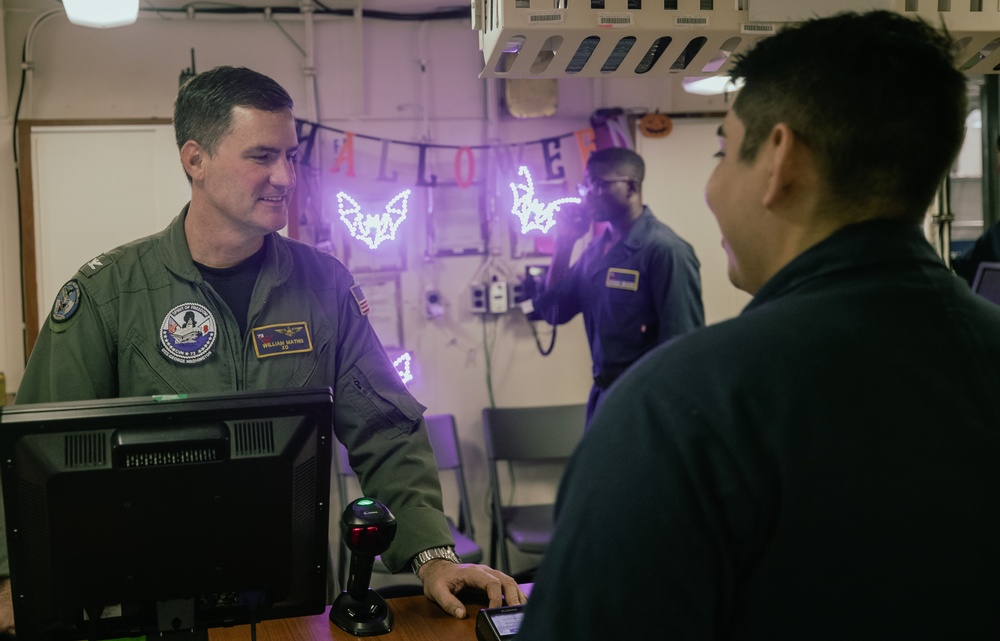 George Washington Executive Officer Works the Ship Store