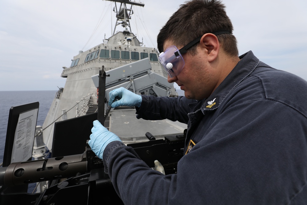 Maintenance on 50-caliber Gun Mount USS Mobile (LCS 26)