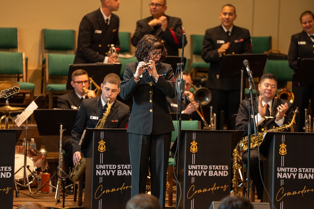 Musician 1st Class Amanda Ballantine performs on piccolo at First Baptist Church in Gainesville, FL