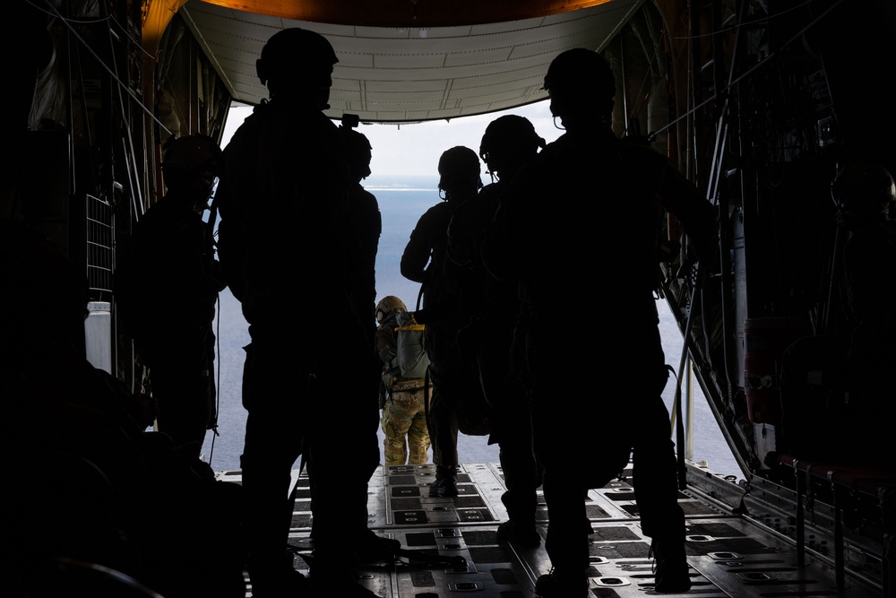 Marines, Airmen, and Soldiers Jump From C-130 Hercules