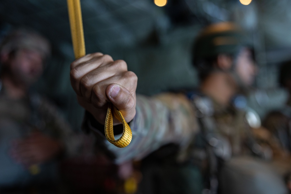 Marines, Airmen, and Soldiers Jump From C-130 Hercules