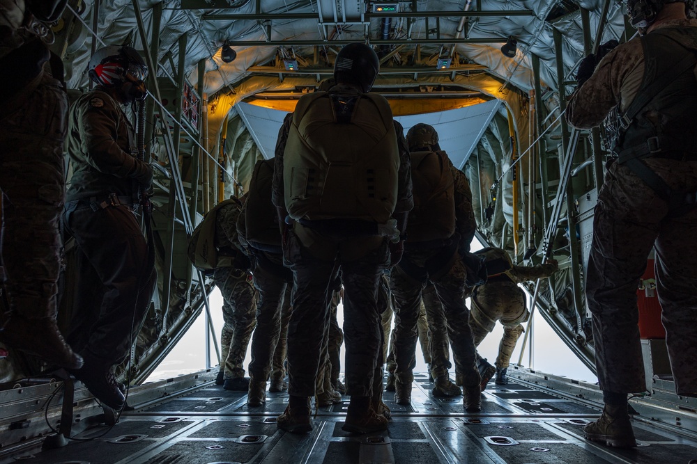 Marines, Airmen, and Soldiers Jump From C-130 Hercules