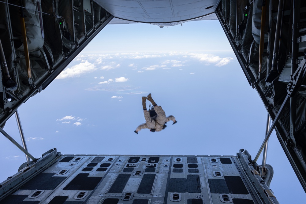 Marines, Airmen, and Soldiers Jump From C-130 Hercules